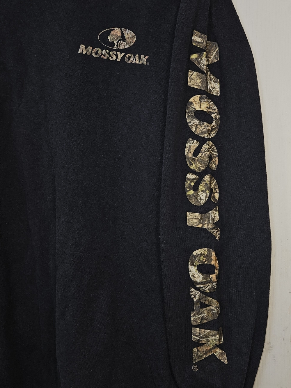 Mossy Oak Black Tee with Camouflage Logo and Sleeve Text
